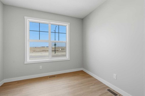 81 Wild Rose Way Se, Calgary, AB - Indoor Photo Showing Other Room