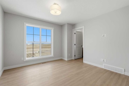 81 Wild Rose Way Se, Calgary, AB - Indoor Photo Showing Other Room