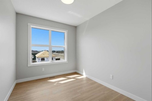 81 Wild Rose Way Se, Calgary, AB - Indoor Photo Showing Other Room