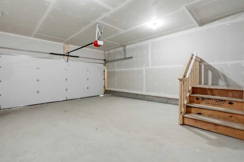 81 Wild Rose Way Se, Calgary, AB - Indoor Photo Showing Garage