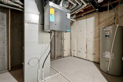 81 Wild Rose Way Se, Calgary, AB - Indoor Photo Showing Basement