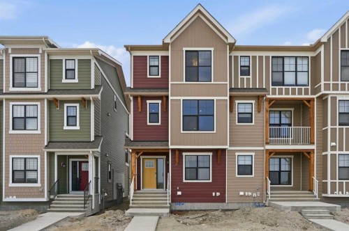 81 Wild Rose Way Se, Calgary, AB - Outdoor With Facade