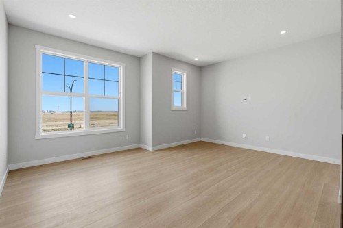 81 Wild Rose Way Se, Calgary, AB - Indoor Photo Showing Other Room