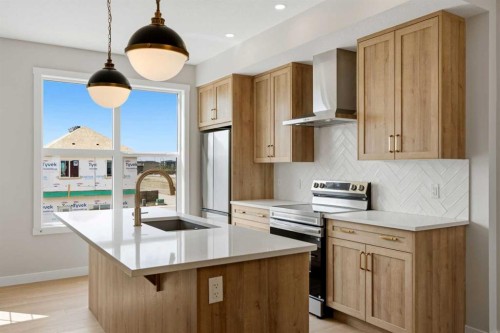81 Wild Rose Way Se, Calgary, AB - Indoor Photo Showing Kitchen