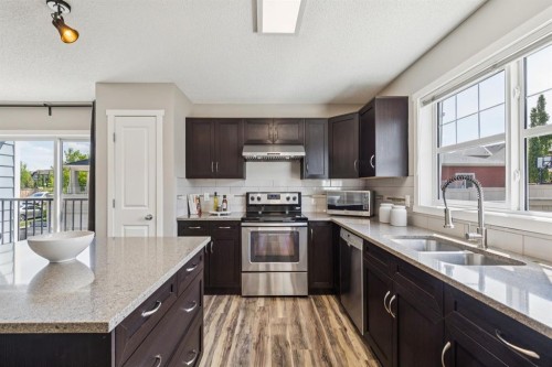 73 Marine Drive Se, Calgary, AB - Indoor Photo Showing Kitchen With Stainless Steel Kitchen With Double Sink With Upgraded Kitchen