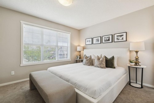 73 Marine Drive Se, Calgary, AB - Indoor Photo Showing Bedroom