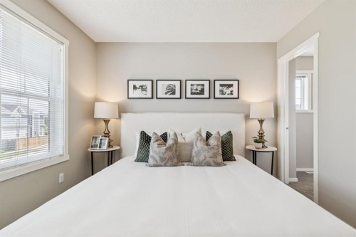 73 Marine Drive Se, Calgary, AB - Indoor Photo Showing Bedroom
