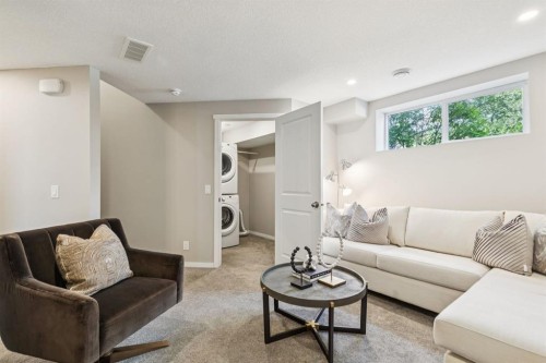 73 Marine Drive Se, Calgary, AB - Indoor Photo Showing Living Room