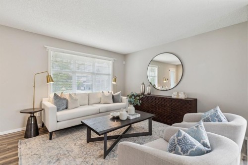 73 Marine Drive Se, Calgary, AB - Indoor Photo Showing Living Room