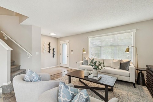 73 Marine Drive Se, Calgary, AB - Indoor Photo Showing Living Room