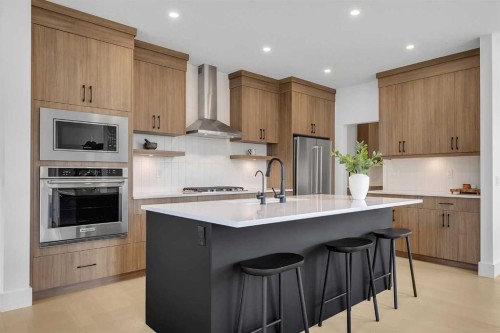 24 Alpine Common Sw, Calgary, AB - Indoor Photo Showing Kitchen With Upgraded Kitchen