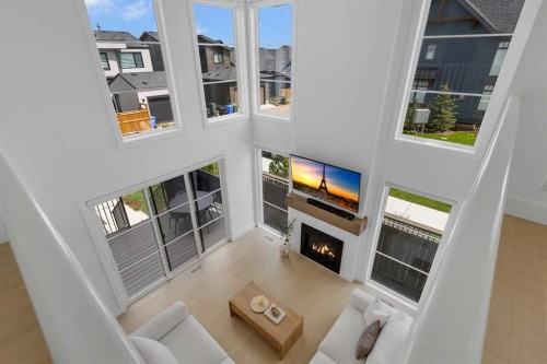 24 Alpine Common Sw, Calgary, AB - Indoor With Fireplace