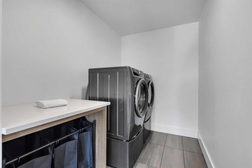 24 Alpine Common Sw, Calgary, AB - Indoor Photo Showing Laundry Room