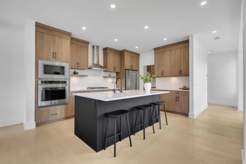 24 Alpine Common Sw, Calgary, AB - Indoor Photo Showing Kitchen With Stainless Steel Kitchen With Upgraded Kitchen