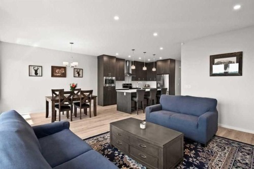 1107 Copperfield Boulevard Se, Calgary, AB - Indoor Photo Showing Living Room