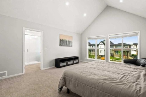 1107 Copperfield Boulevard Se, Calgary, AB - Indoor Photo Showing Bedroom