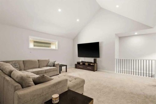 1107 Copperfield Boulevard Se, Calgary, AB - Indoor Photo Showing Living Room