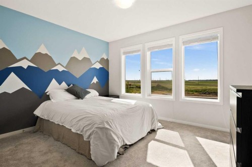 1107 Copperfield Boulevard Se, Calgary, AB - Indoor Photo Showing Bedroom