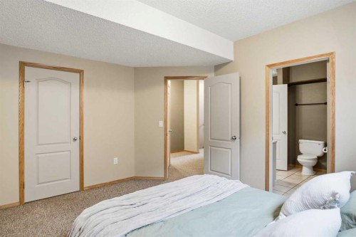 B-4810 47 Street, Olds, AB - Indoor Photo Showing Bedroom