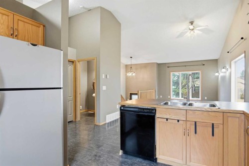 B-4810 47 Street, Olds, AB - Indoor Photo Showing Kitchen With Double Sink