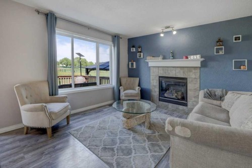 316 Ranch Garden, Strathmore, AB - Indoor Photo Showing Living Room With Fireplace