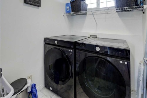 316 Ranch Garden, Strathmore, AB - Indoor Photo Showing Laundry Room