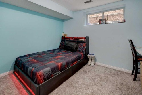 316 Ranch Garden, Strathmore, AB - Indoor Photo Showing Bedroom