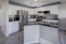 316 Ranch Garden, Strathmore, AB  - Indoor Photo Showing Kitchen With Double Sink 