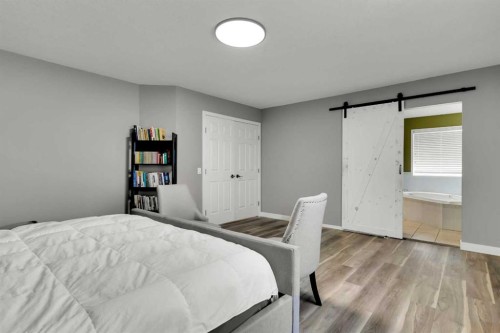 6 Douglas Woods Bay Se, Calgary, AB - Indoor Photo Showing Bedroom