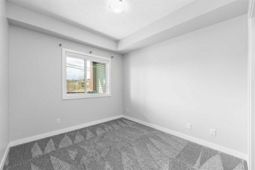 205-12 Sage Hill Terrace Nw, Calgary, AB - Indoor Photo Showing Other Room