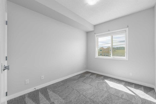 205-12 Sage Hill Terrace Nw, Calgary, AB - Indoor Photo Showing Other Room