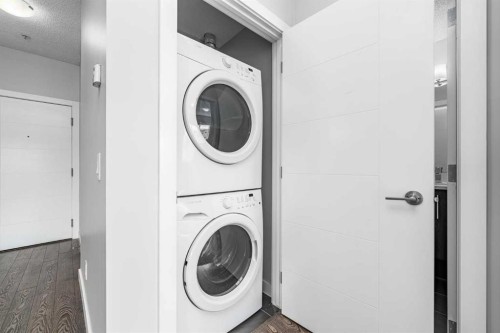 205-12 Sage Hill Terrace Nw, Calgary, AB - Indoor Photo Showing Laundry Room