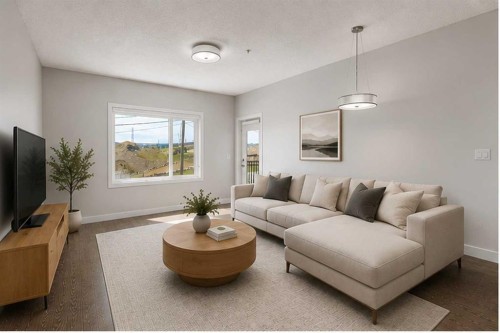 205-12 Sage Hill Terrace Nw, Calgary, AB - Indoor Photo Showing Living Room