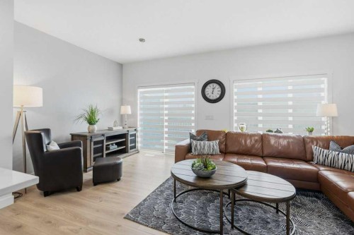 55 Heritage Manor, Cochrane, AB - Indoor Photo Showing Living Room