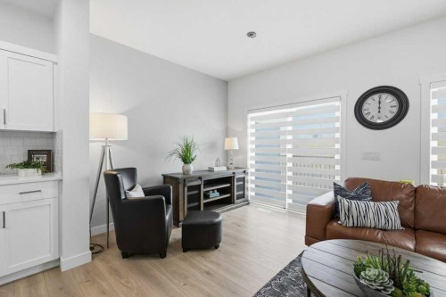 55 Heritage Manor, Cochrane, AB - Indoor Photo Showing Living Room
