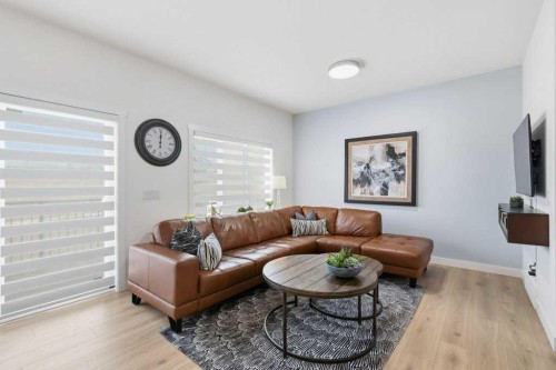 55 Heritage Manor, Cochrane, AB - Indoor Photo Showing Living Room