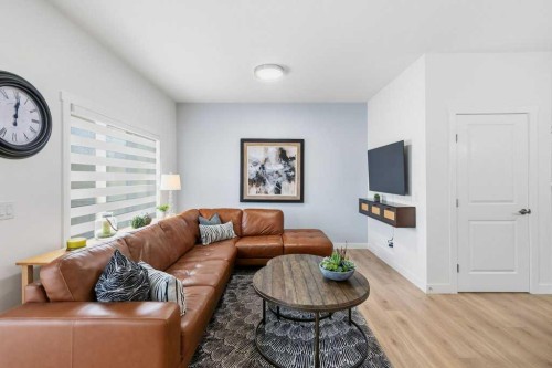 55 Heritage Manor, Cochrane, AB - Indoor Photo Showing Living Room