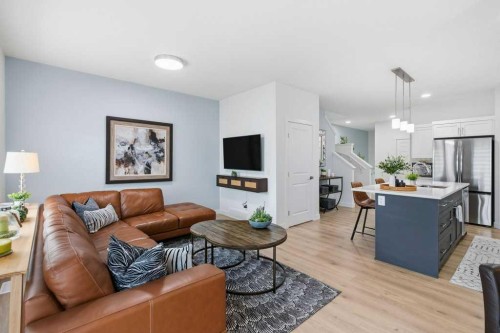 55 Heritage Manor, Cochrane, AB - Indoor Photo Showing Living Room
