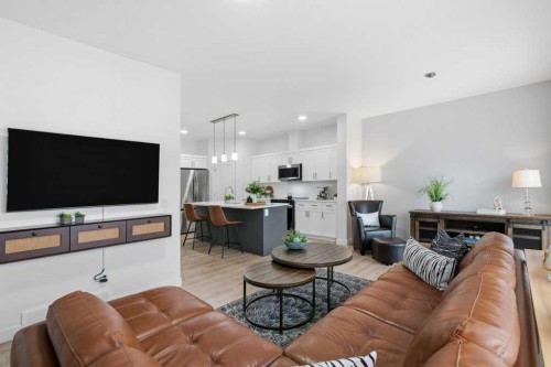 55 Heritage Manor, Cochrane, AB - Indoor Photo Showing Living Room