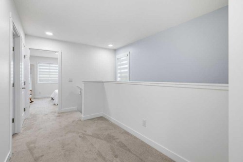 55 Heritage Manor, Cochrane, AB - Indoor Photo Showing Other Room