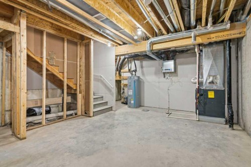 55 Heritage Manor, Cochrane, AB - Indoor Photo Showing Basement