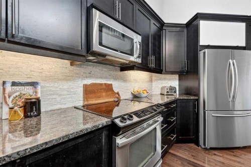 31 Cranford Close Se, Calgary, AB - Indoor Photo Showing Kitchen With Stainless Steel Kitchen With Upgraded Kitchen