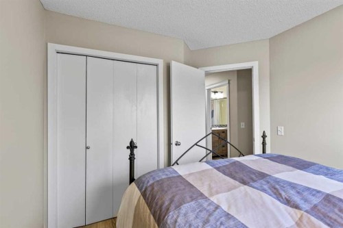 65 Prestwick Heights Se, Calgary, AB - Indoor Photo Showing Bedroom
