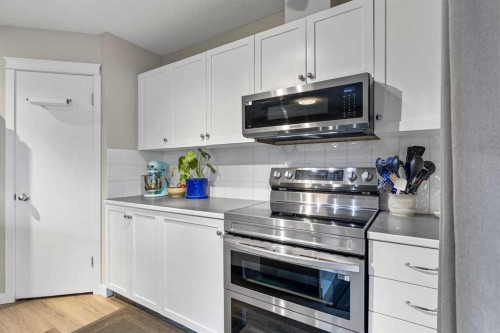65 Prestwick Heights Se, Calgary, AB - Indoor Photo Showing Kitchen