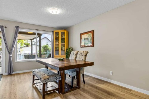 65 Prestwick Heights Se, Calgary, AB - Indoor Photo Showing Dining Room