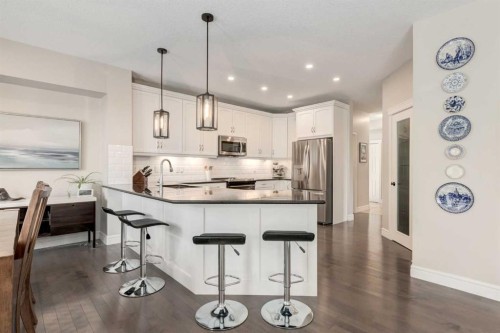 335 Morningside Crescent Sw, Airdrie, AB - Indoor Photo Showing Kitchen With Upgraded Kitchen