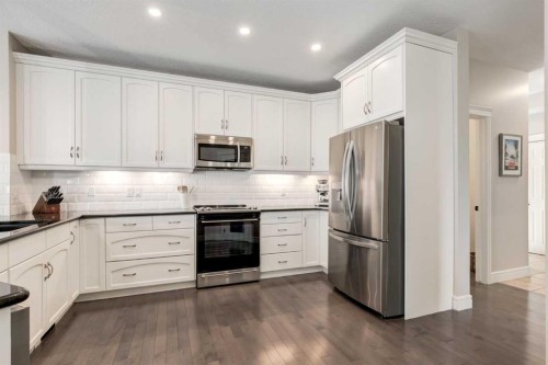335 Morningside Crescent Sw, Airdrie, AB - Indoor Photo Showing Kitchen With Upgraded Kitchen