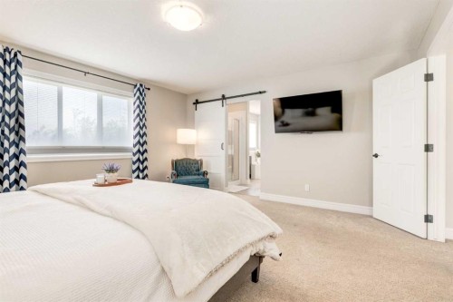 335 Morningside Crescent Sw, Airdrie, AB - Indoor Photo Showing Bedroom