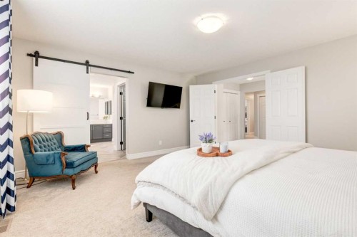 335 Morningside Crescent Sw, Airdrie, AB - Indoor Photo Showing Bedroom