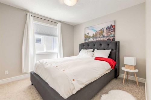335 Morningside Crescent Sw, Airdrie, AB - Indoor Photo Showing Bedroom